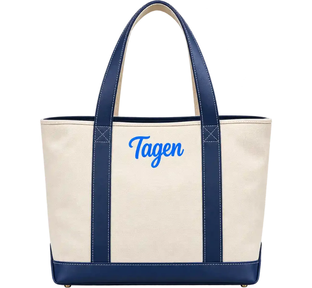 Blue canvas tote bag with sturdy handles.