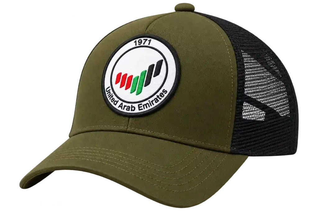 Olive green cap with custom badge design.