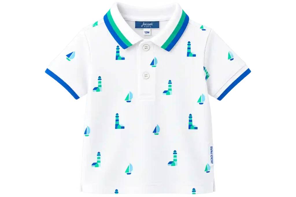 White kids polo shirt with blue printed pattern.