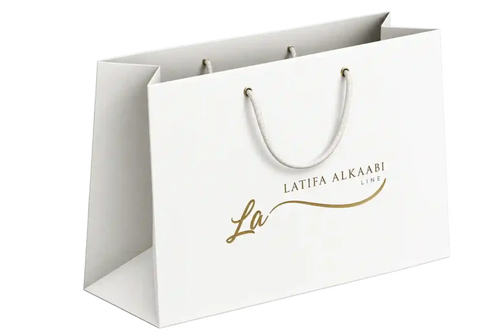 Small white branded paper bag for Handbag Printing Services in Riyadh.